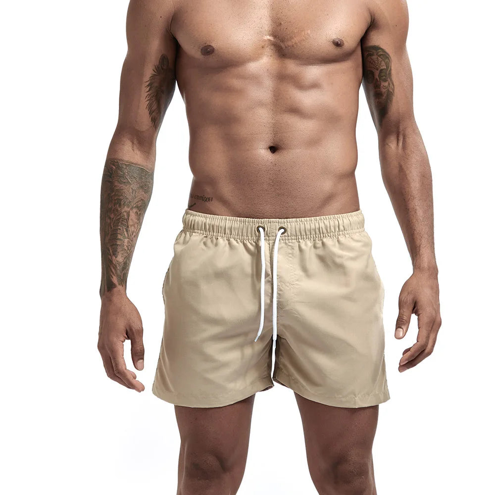 Beige board shorts