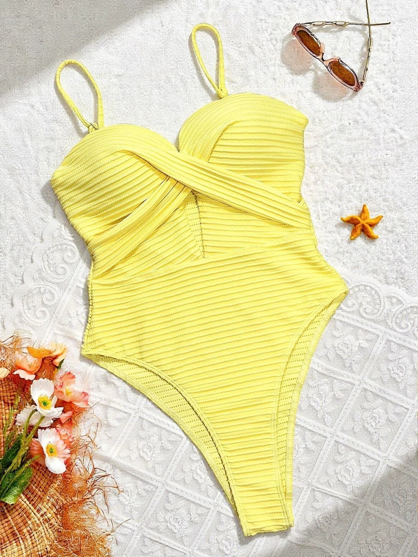 Yellow one-piece swimsuit detail