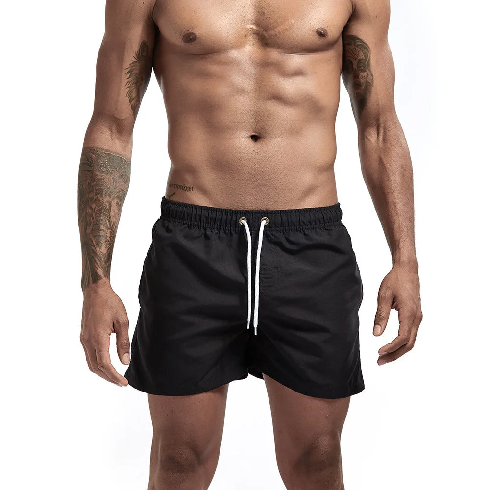 Black board shorts