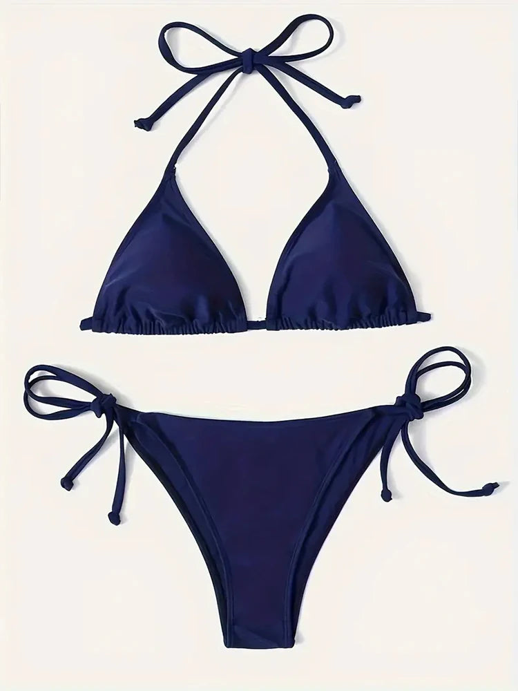 Model wearing navy blue bikini set