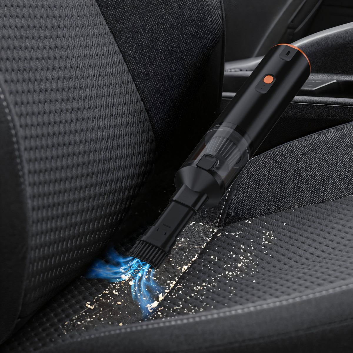 VC28 handheld vacuum cleaning crumbs from a fabric sofa
